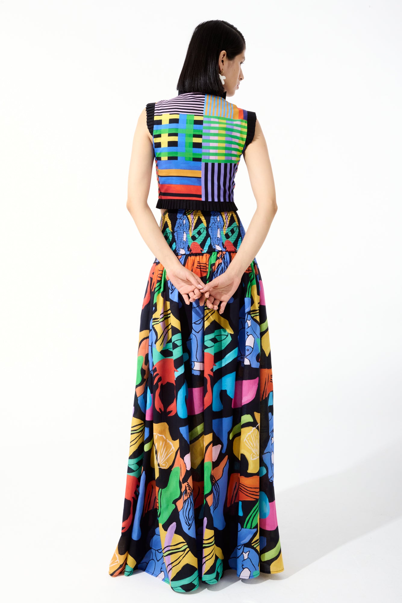 Beso Skirt in Pesca Print: A charming prairie high waisted  maxi skirt adorned with a playful multicolor print, perfect for a breezy and feminine springtime look by De Loreta.